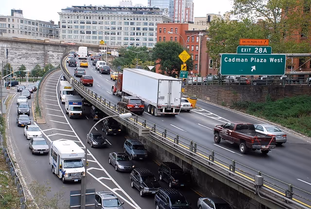 Commercial truck driving through BQE